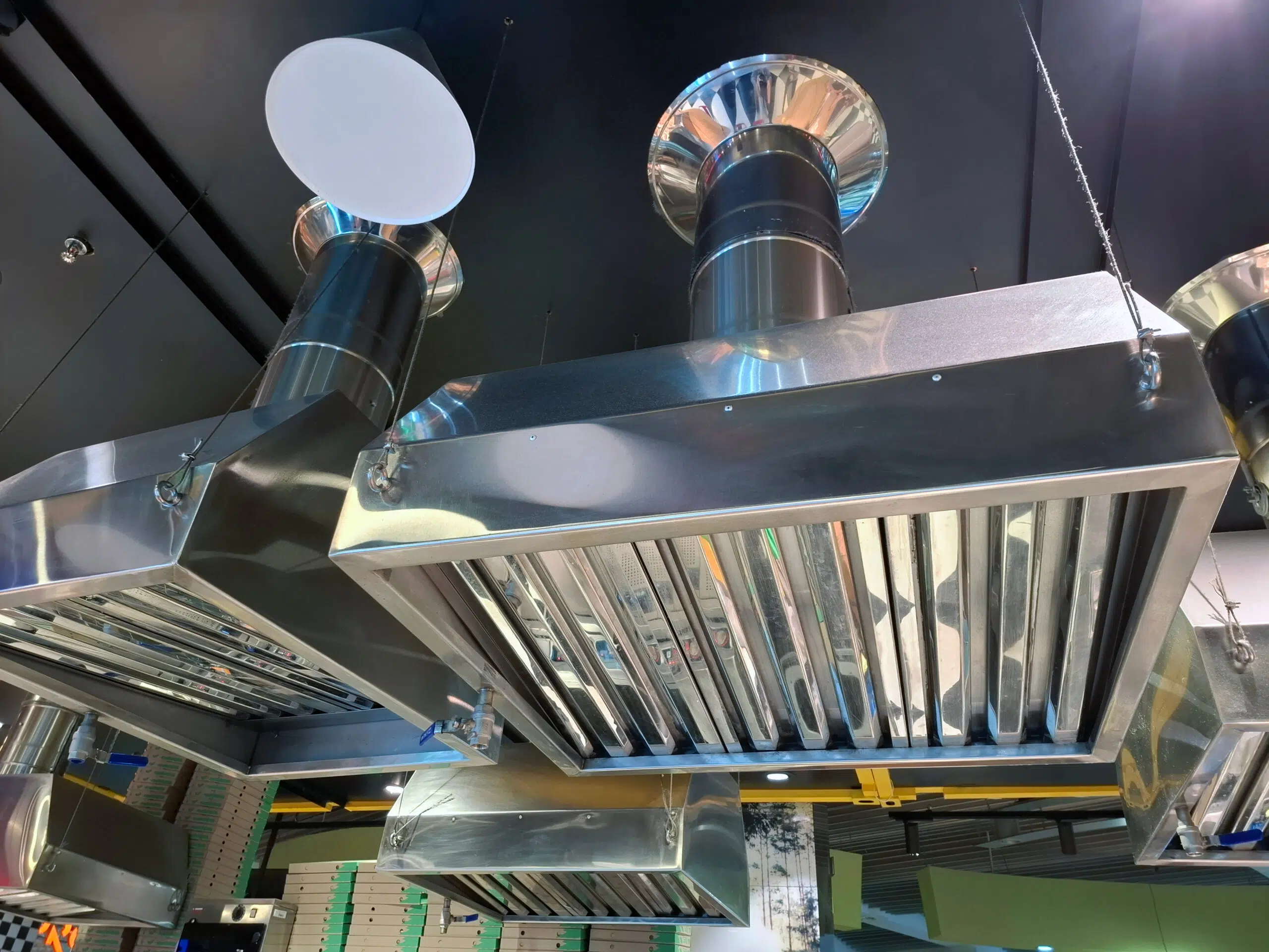 Metal kitchen hoods with vents